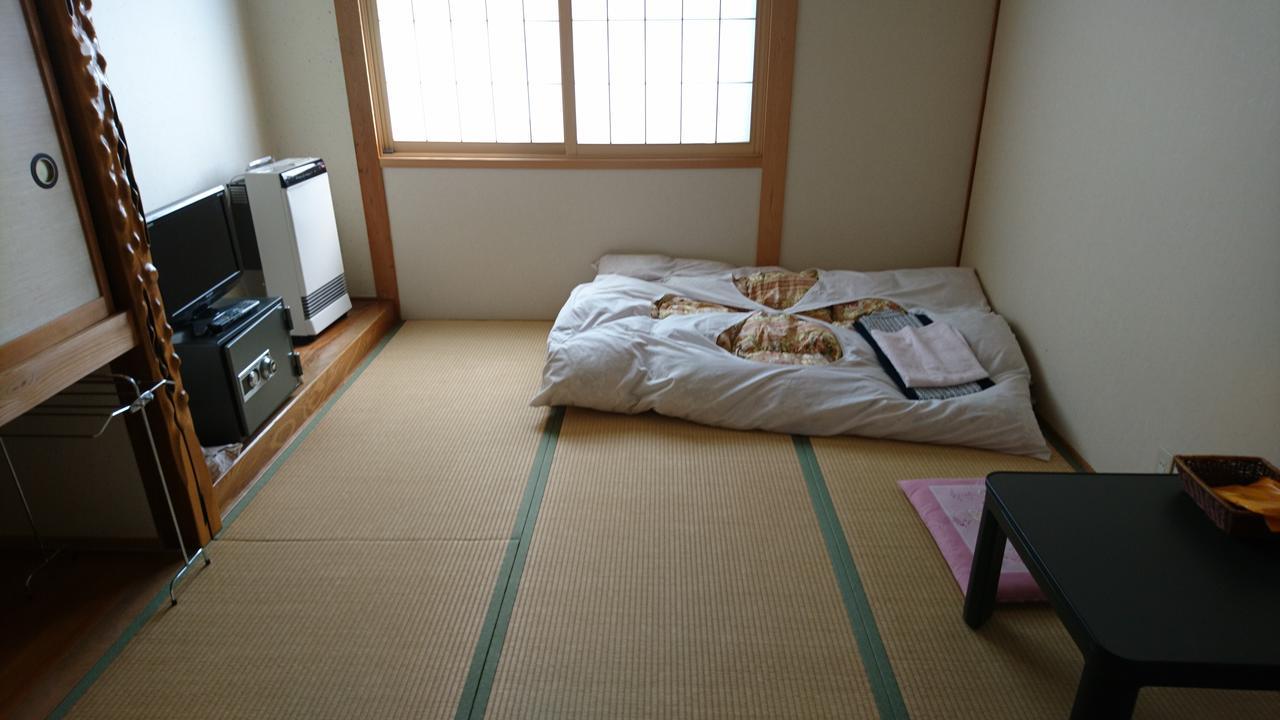 Apple Inn Takasaka Nozawaonsen Buitenkant foto