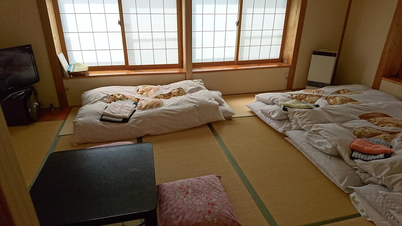 Apple Inn Takasaka Nozawaonsen Buitenkant foto